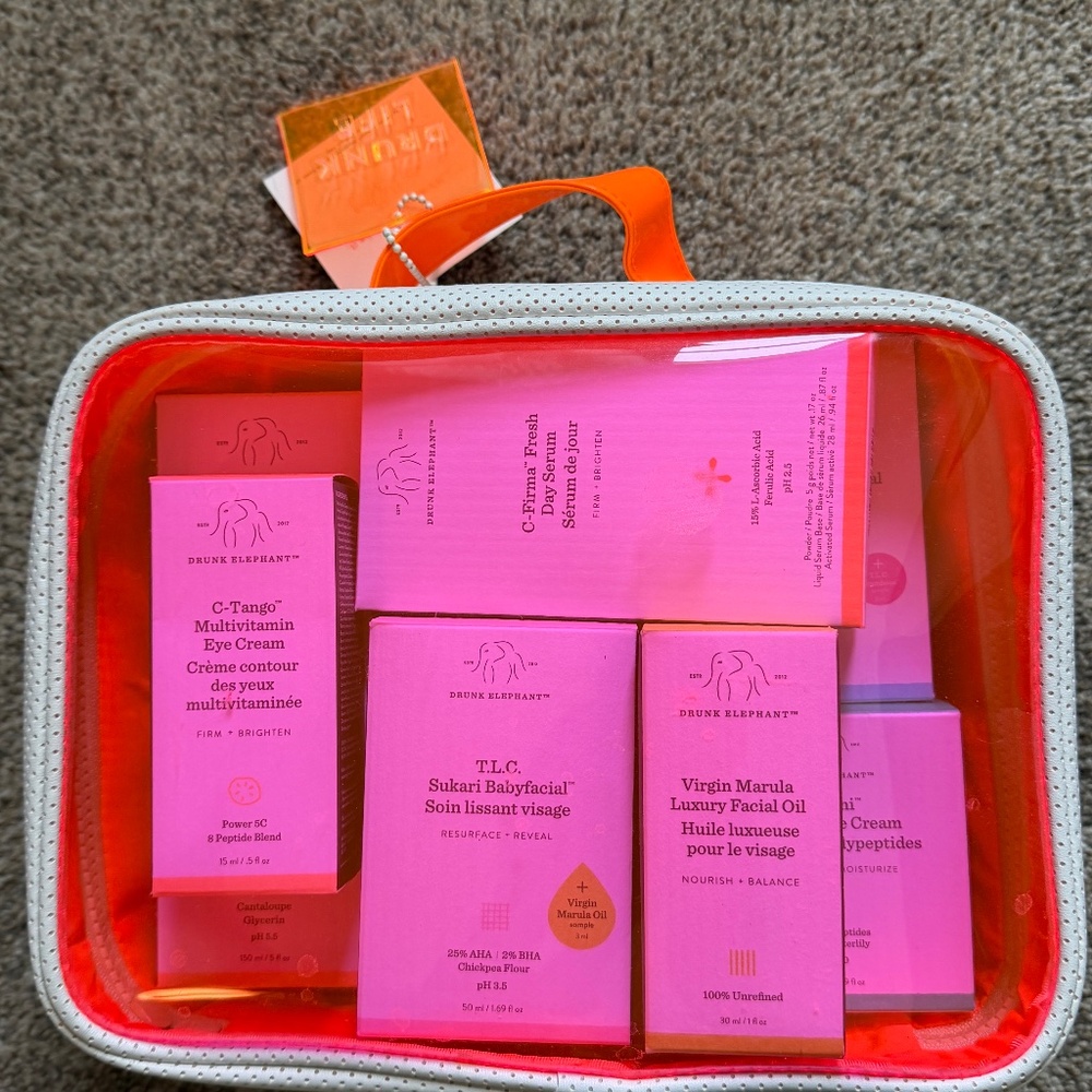 NIB Lot of 9 FULL SIZE Drunk Elephant Skincare Items with Carrying Case